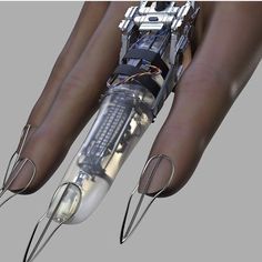 an image of a robotic hand with wires attached to the arm and fingers on it