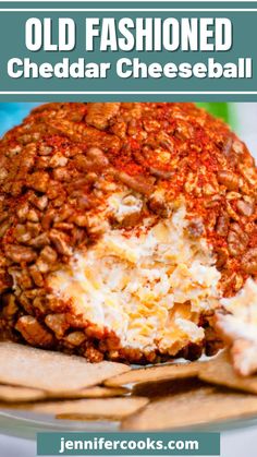 an old fashioned cheddar cheeseball on a plate