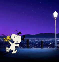 a cartoon character holding a flower in front of a cityscape with a street light