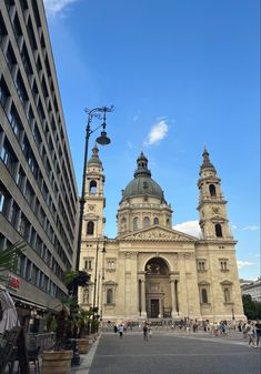 an old church in the middle of a city