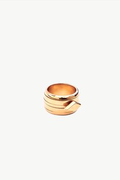 Our 24K gold-plated stress-relief ring is both charming and stylish. Inspired by the fidget ring, it features our signature diamond-shaped charm that glides around the band to soothe you during moments of stress and anxiety. Just give it a twirl to find relief. Made from recycled brass and plated in 24K gold or silver toned chrome. Dimensions:  Width of Band: 0.47in (12mm) Center Accent: 0.24in x 0.49in (6.2mm x 12.5mm) Stackable Necklaces, Spinning Rings, Stacked Earrings, Fidget Rings, Stackable Bracelets, Diamond Shaped, Wood Jewellery, Chain Choker, Gold Plated Silver