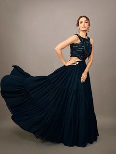 Women Stylish Navy Blue Embellished Top with Solid Skirt - Inddus.com Embellished Party Sets With Tiered Skirt, Party Sets With Embellished Tiered Skirt, Party Georgette Lehenga With Tiered Skirt, Party Tiered Georgette Lehenga, Embellished Georgette Skirt For Party, Embellished Tiered Lehenga For Party, Festive Blue Party Skirt, Elegant Georgette Skirt Set For Party, Long Georgette Skirt For Party