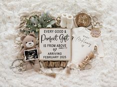 a baby's birth announcement surrounded by items such as a teddy bear and t - shirt