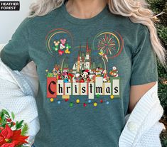 Christmas Mouse And Friends Shirt, Christmas Shirts, Mickey Mouse Shirt, Magic Kingdom Shirt, Mickey Christmas, Family Christmas Shirts SIZE - We have size chart on our listing photos. - The shirts are unisex size--not women's fitted shirts. Women`s can downsize their regular size if they want a fitted look. SHIPPING AND PRODUCTION TIME + Production time is 1-3 business days. + Shipping Time is 1-5 business days. +If you are in a RUSH, Please contact us. CARE INSTRUCTION -Inside out, wash with delicate cycle. - Lay flat to dry - Do not bleach - Do not iron directly onto the design - Do not dry clean. All my T-shirts are from Bella + Canvas. Your personalization will bring another level of difference to this high quality 4.2 oz. garment My shirts are unisex fit so they are comfortable and h Christmas Disney Shirt, Trip Fits, Magic Kingdom Shirt, Mickey Mouse Shirt, Fitted Shirts, Mickey Christmas, Mickey Mouse Shirts, Disney Travel, White Candy