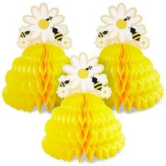 four honeycombs with flowers and bees on them