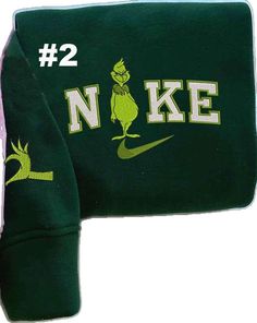 Green Embroidered Tops For Winter, Green Tops With Letter Embroidery For Winter, Green Top With Letter Embroidery For Winter, Green Letter Embroidery Top For College, Green College Top With Letter Embroidery, Winter Green Sweatshirt With Embroidered Logo, Green Embroidered Text Sweatshirt For Winter, Green Winter Sweatshirt With Embroidered Logo, Whoville Sweatshirt