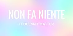 the words non fa niente it doesn't matter on a blurred background