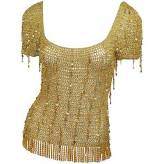 Loris Azzaro 1970s Vintage Gold Knit Bead Fringe Chain Top Loris Azzaro top featured a gold metallic knit with dangling beads and chains throughout, and a gold fringed chain hem. In excellent vintage condition. Measurements are as follows: bust - 34'' waist - 32'' length - 16'' Loris Azzaro, 90s Y2k Fashion, Slim Aarons, Golden Birthday, Chain Top, Vintage Clothes Women, Beaded Top, Cream Lace, College Fashion