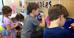 several children are playing with toys in a classroom