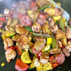 the food is being cooked on the grill