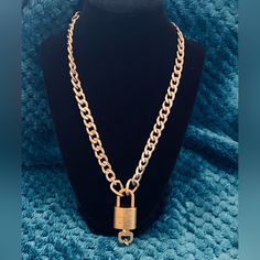 Authentic Louis Vuitton Lock And Key On A Generic 19" Chunky Chain Necklace With Adjustable Clasp. The Lock And Key Have Minimal Wear, Pits And Scratches. Tags Jewelry Keychain Necklace Unisex Luxury Elegant Necklace With Lock Detail, Luxury Lock Necklace As Gift, Luxury Gold-plated Coin Necklace With Adjustable Chain, Louis Vuitton Lock Necklace, 2pcs Lock Charm & Necklace, Keychain Necklace, Chunky Chain Necklaces, Louis Vuitton Jewelry, Lock And Key