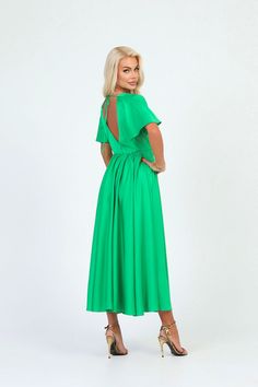 Formal Green Maxi Dress With Pleated Back, Green Midi Evening Dress, Pleated Maxi Length Bridesmaid Dress, Pleated Maxi Dress For Bridesmaids, A-line Pleated Dress For Wedding Guest, Green Short Sleeve Midi Dress For Evening, Green V-neck Midi Bridesmaid Dress, Green Knee-length Midi Dress For Wedding, Green Short Sleeve Dress For Wedding