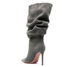 Not your average scrunched denim booties. Step into the realm of edgy sophistication with these black denim booties, where contemporary style meets timeless cool. Elevating your style to new heights, these booties feature a tall, skinny heel that exudes confidence and glamour. The slender heel not only adds a touch of drama but also elongates your silhouette, making a bold statement with every step. Product details: Heel height: 4.5" Fits true to size Material: Dark Wash Denim