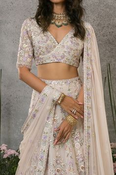 Pale pink organza silk lehenga with thread, sequins, cutdana, and beaded embroidery. Comes with a blouse and a net dupatta.
Component: 3
Pattern: Embroidered
Type Of Work: Thread, Sequins, Cutdana, Beads
Neckline: V Neck
Sleeve Type: Half
Fabric: Lehenga and Blouse : Organza silk, Dupatta : Net, Lining : Shantoon
Color: Pink
Other Details: 
Closure : Zip on the side for lehenga and hooks at the back for blouse.
Occasion: Wedding, Bride - Aza Fashions Pink Pre-draped Saree With Intricate Embroidery For Reception, Pink Tissue Silk Lehenga With Unstitched Blouse, Pink Organza Lehenga With Cutdana, Pink Organza Lehenga With Pallu, Pink Organza Choli With Cutdana, Navratri Pink Pre-draped Saree With Intricate Embroidery, Pink Tissue Silk Lehenga For Reception, Pink Cutdana Organza Choli, Wedding Lehenga In Tissue Silk With Unstitched Blouse