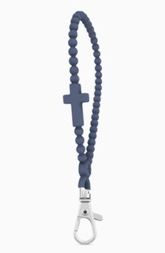 a blue lanyard with a cross on it