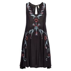 Awaken The Muse Of Style And Finesse With The Free People Women's Embroidered Mini Dress, A Creation Forged In The Vibrant Lands Of India. Enveloped In The Delicate Embrace Of 100% Rayon, This Light-Weight Canvas Of Artistry Transcends Mere Fashion To Become A Testament Of Modern And Vibrant Femininity. Adorned With The Richness Of Embroidered Accents And A Dance Of Buttons That Play Along Its Curves, This V-Neck Ensemble Promises You An Escapade Of Casual Elegance And Enigmatic Charm._x0001_ima Black Embroidered Beach Dress For Spring, Spring Beach Embroidered Black Dress, Spring Beach Black Embroidered Dress, Black Embroidered Dress For Beach, Embroidered Black Summer Dress, Black Embroidered Dress With Floral Details For Beach, Black Floral Embroidered Dress For Beach, Black Floral Embroidered Beach Dress, Black Beach Dress With Floral Embroidery