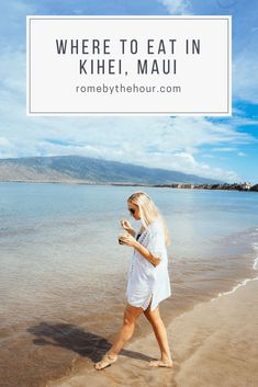 a woman walking on the beach with text overlay where to eat in kihei, mau