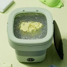 an ice cream maker sitting on top of a table