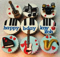 decorated cupcakes with musical instruments and music notes