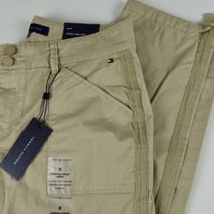 Tommy Hilfiger Pants Chelsea Cargo Ankle Style Perfect For Hike Or Coffee Run Cotton Stretch Fabric Straight Leg Sits At Natural Waist Drawstring Adjustment At Bottom Leg Side Hand Pockets Flap Cargo Leg Pockets Double Button/Zip Closure Th Flag Logo On Hip Inseam About 26” Brand New With Tags Pricing Is Fair And Quite Firm . Please Let Us Know If You Have Any Questions. Tommy Hilfiger Straight Leg Spring Pants, Tommy Hilfiger Spring Trousers, Tommy Hilfiger Pants For Spring Workwear, Tommy Hilfiger Tapered Leg Bottoms With Pockets, Tommy Hilfiger Tapered Leg Pants With Pockets, Spring Tommy Hilfiger Pants With Pockets, Tommy Hilfiger Casual Pants For Spring, Tommy Hilfiger Tapered Leg Workwear Bottoms, Casual Tommy Hilfiger Trousers