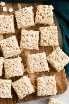 rice krispy treats on a cutting board with marshmallows