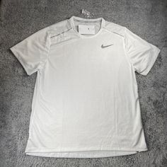 Item: Nike Dri-Fit Miler Running Shirt White Men Style Code: Cu0326-100 Condition: 100% Authentic. Brand New With Tags. Never Worn Size: Xl Men's Color: White Seller Notes: -100% Trusted Seller. Your Satisfaction Is Very Important To Me! -Orders Before 8am Pst Will Ship Out Same Day; Orders After 8am Pst Will Ship Out Next Business Day, Guaranteed!(Special Requests Available, Please Ask!) -Shipping From California -Bundles Available!!! -All Sales Are Considered Final. Unless, Wrong Item Was Rece Nike White Sports Shirt, Classic White Sports Top, Nike White Short Sleeve Shirt, Classic White Nike Tops, Black Graphic Tees, Dri Fit Shirt, Levi Jeans 501, Nike Tshirt, White Men