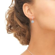 Wear these stylish earrings to enhance your daytime and evening attire. The perfect addition to any jewelry collection, these stunning earrings for women and teen girls feature 7mm cushion-cut stones made with Swarovski Zirconia delightfully set into highly polished sterling silver and are adorned with a sparkling halo border. These elegant and unique earrings are crafted of fine sterling silver and are secured by lever-backs. Nickel & tarnish free. These earrings in fine jewelry are a great Gem Earrings, Luxury Earrings, Heart Drop Earrings, Leverback Earrings, Stylish Earring, Trendy Earrings, Dangling Earrings, Delicate Earrings, Stunning Earrings