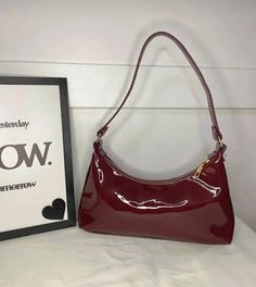 ✨ Elevate your style with our Burgundy Elegance handbag! ✨ Crafted from luxurious patent leather, this stunning accessory seamlessly combines sophistication with a touch of modern flair. The deep burgundy hue exudes confidence and versatility, making it the perfect companion for any occasion. 🌟 🎁 Perfect Gift: Surprise a special woman in your life with the Burgundy Elegance handbag - a timeless and elegant gift that will leave a lasting impression. Carry sophistication wherever you go with our Burgundy Elegance handbag. Embrace the confidence that comes with a stylish accessory that complements your unique personality. Order yours now and make a statement in every stride! 👜✨ Hello, Thank you for choosing to shop with us on Etsy! We appreciate your support and are thrilled to be able to Y2k Crossbody Bag, Dark Red Handbag, Dark Red Shoulder Bag, Burgundy Shoulder Bag, Red Purse Aesthetic, Dark Red Purse, Burgundy Handbag, Burgundy Clutch, Burgundy Purse