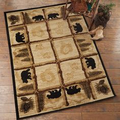 a rug with bears and pine cones on it