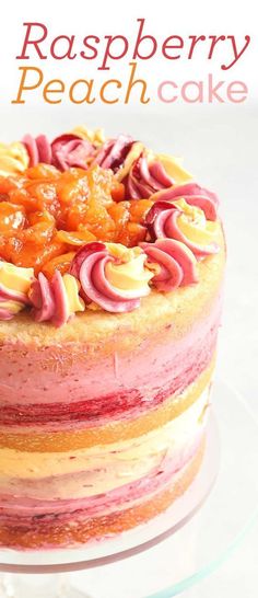 a cake with raspberry and peaches on top is sitting on a plate