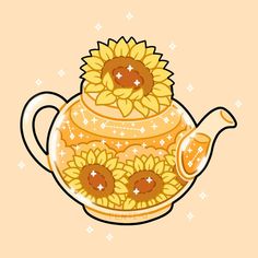 a tea pot with sunflowers on it