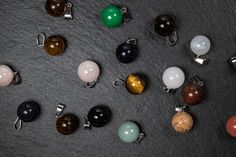 Round gemstone Ball Pendant, Variety of Stone Types to Choose from - some natural (N), some natural colored (C), some synthetic ( S). Please note stone patterns and undertones may vary, you will receive a random pendant of selected material. Stone Size: approx 13-14mm in diameter Finding attachment Hole Size: about 2-3 mm Price per 1 pendant Thank you ;) Gemstone Beads For Gifts, Stone Types, Moon Pendant Necklace, Stone Pattern, Ball Pendant, Agate Pendant, Moon Pendant, Crystal Points, Gold Paint