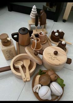 various wooden utensils are arranged on the floor