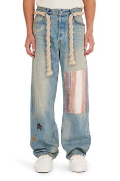 LIGHT WASH THEMED BAGGY JEANS 100% COTTON FIVE-POCKET STYLING MIRACLE & STAR THEMED MOTIFS ALL OVER PATCH DESIGN EMBROIDERED ON LEG EXPOSED STITCHING DESIGN BAGGY FIT NAHMIAS BUTTON CLOSURE BELT LOOPS THICK ROPE BELT SPECIAL WASH TECHNIQUE & TREATMENT DRY CLEAN ONLY SKU: D5-P43-494 SIZE GUIDE Streetwear Jeans Men, Yarn Jeans, Jeans Outfit Men, Outfit Hombre, Streetwear Jeans, Rope Belt, Denim Outerwear, Thick Rope, Mens Fashion Streetwear