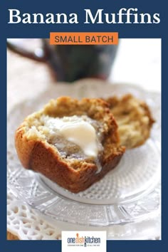 banana muffins are sitting on a glass plate with white frosting in the middle