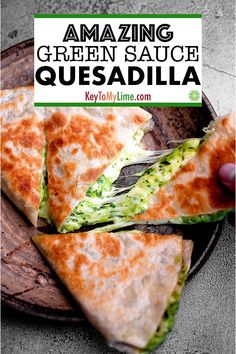 a close up of a pizza on a plate with text overlay reading amazing green sauce quesadilla