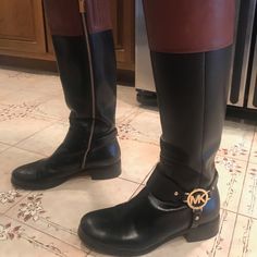 The Best Boots. Size 6. Black And Brown Leather. Mk Medallion On Foot. Worn Twice. In Great Condition. Bought For $295 (See Receipt). Michael Kors Tall Boots, Michael Kors Brown Leather Boots, Michael Kors Brown Round Toe Boots, Michael Kors Black Leather Boots, Michael Kors Round Toe Boots With Branded Heel, Best Boots, Cool Boots, Michael Kors Shoes, Michael Kors Black