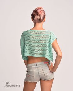 "Summer Crop Top, Cotton Knit Top, Beachy Top XS to XXL / Summer crop top made of cotton yarn. Here shown in light aquamarine. You can choose any of our colors shown in the samples! Knitted with great care in smoke-free & pet-free environment! Yarn: - 80% cotton - 20% acrylic Measurements: XS (US 0-2; UK 4-6; EU 32-34) bust - 82 cm ( 32\" ) length - 36 cm ( 14.2\" ) S (US 4-6; UK 8-10; EU 34-36) bust - 88 cm ( 35\" ) length - 36 cm ( 14.2\" ) M (US 8-10; UK 12-14; EU 38-40) bust - 94 cm ( 37 Beach Green Knit Tops, Green Knitted Beach Sweater, Beach Crew Neck Pointelle Knit Tops, Beach Crew Neck Top With Textured Knit, Pointelle Knit Top For Beach, Pointelle Knit Top For The Beach, Beach Pointelle Knit Top, Green Knit Beach Top, Summer V-neck Knitted Top