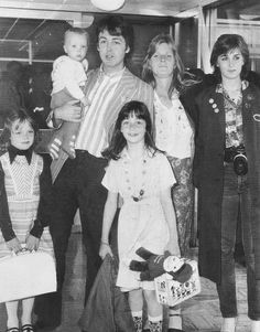 an old black and white photo of a family