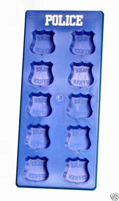 an ice tray with police emblems on the front and back of each cookie sheet