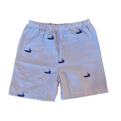 Blue and white striped seersucker shorts with navy embroidered Nantucket. Elastic waist, back pocket. Spring Cotton Swim Trunks For Playwear, Cotton Swim Trunks For Summer Playwear, Summer Cotton Swim Trunks For Playwear, Spring Casual Cotton Swim Trunks, Playful Striped Shorts For Summer, Playful Striped Summer Shorts, Playful Cotton Swim Trunks With Built-in Shorts, Summer Seersucker Bottoms For Vacation, Striped Cotton Swim Trunks For Spring