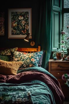 a bedroom with green curtains and floral bedding