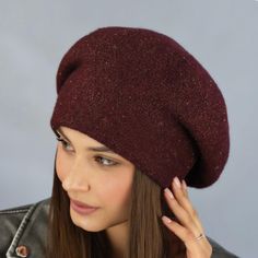 Stay warm, stay stylish!  Introducing the NOVELTY Wool Slouchy Knit Beret for Women. This Winter French beret hat features an inner lining for added comfort and warmth. Its oversized design makes it a cozy and stylish accessory, perfect for the colder months. Ideal for gifting, this beret is a great choice for birthdays or Christmas presents for her. Stay chic and cozy with this fashionable and practical addition to your winter wardrobe. Yarn composition: 28% PAC, 20% wool, 24% PES, 12% polyamid Winter Beret Beanie One Size Fits Most, Winter Beret One Size Fits Most, Winter Wool Beret, Slouchy Winter Beret, Slouchy Casual Beret For Winter, One Size Winter Beret, Winter Wool Brimmed Beret, Winter Wool Hat As Gift, Brown One Size Beret For Winter