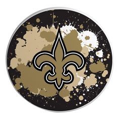 the new orleans saints logo is painted on an old black and gold paint splattered circle