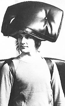 a woman wearing a large hat on top of her head