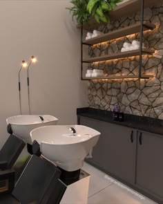 two white sinks sitting next to each other on top of a counter in a bathroom