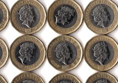 One pound coins from the United Kingdom. royalty free stock photo One Pound Coin, One Pound, Free Stock Photos, United Kingdom, The Unit