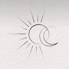 the sun and moon are drawn on paper