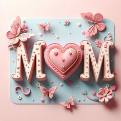 a mother's day card with pink butterflies and a heart in the shape of a cookie