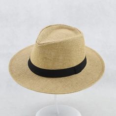 The Panama hat is not only a fashion but also a fine handmade artwork. Lightweight, breathable, and shading make it the darling of summer trends. Authentic Quality Genuinely handmade by master weavers directly!Excellent Sun Protection With a UPF 50+ rating, these hats provide the perfect amount of shade during sunny weather! One Size Fits Most Fedora hat circumference:23.2",wide brim:2.65",one size fits most man women lady girl. Elegant and Stylish The ideal accessory to add extra fashion into a Casual Lightweight Hat, One Size Fits Most, Casual Straw Hat With Short Brim For Warm Weather, Casual Short Brim Straw Hat For Warm Weather, Casual Brimmed Hat For Beach Season, Natural Lightweight Casual Boater Hat, Casual Lightweight Natural Boater Hat, Casual Lightweight Flat Brim Hat, Adjustable Solid Crochet Hat, Casual Crochet Bucket Hat For Travel